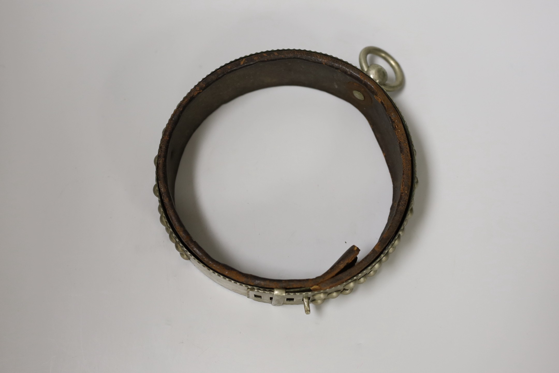 A Victorian nickel studded dog collar engraved 'EMON, MRS KING 9 CASTELLAIN RD. MAIDA VALE', 16.5 cm diameter